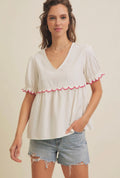 White scalloped top - red trim